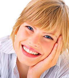 photo of a smiling woman - she likes her orthodontist